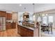 Open concept kitchen flows into dining area and living room, perfect for entertaining at 1283 Silver Trace Sw Dr, Lilburn, GA 30047