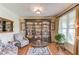Cozy living room with built-in bookshelf, and plenty of natural light at 1283 Silver Trace Sw Dr, Lilburn, GA 30047