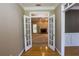 View of a light-filled living room showcasing French doors at 19 Thimblemill Ct, Villa Rica, GA 30180