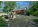 Detached outbuilding with a two-car garage and charming garden in a serene setting at 19 Thimblemill Ct, Villa Rica, GA 30180