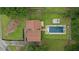 Aerial view of a home with a large backyard featuring a pool and a deck surrounded by trees at 35 Lady Morgan Ln, Dallas, GA 30157
