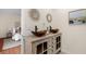 Bathroom featuring a double sink vanity with a rustic wood cabinet and vessel sinks at 35 Lady Morgan Ln, Dallas, GA 30157