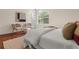 Bright bedroom featuring hardwood floors, neutral walls, a large window and contemporary decor at 35 Lady Morgan Ln, Dallas, GA 30157