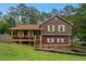 Charming two-story home featuring a cozy front porch and a well-maintained lawn at 35 Lady Morgan Ln, Dallas, GA 30157