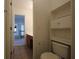 View of a bathroom showing sink and cabinet, toilet with cabinet and shower-tub combo at 838 Roxholly Ln, Buford, GA 30518