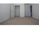 Neutral bedroom with a closet, neutral-toned walls, and carpet at 838 Roxholly Ln, Buford, GA 30518