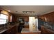 Updated kitchen with stainless steel appliances, track lighting, and wooden cabinets for a modern look at 838 Roxholly Ln, Buford, GA 30518
