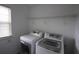 Laundry room featuring new appliances, providing efficiency and convenience at 838 Roxholly Ln, Buford, GA 30518