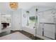 Primary bathroom features a soaking tub, glass-enclosed shower, and access to the primary bedroom at 121 Bradshaw Park Dr, Woodstock, GA 30188