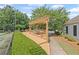 A covered picnic area with seating offers a great spot for outdoor dining and community gatherings at 121 Bradshaw Park Dr, Woodstock, GA 30188