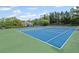 Enjoy friendly competition on the community's well-maintained tennis courts, perfect for active residents at 121 Bradshaw Park Dr, Woodstock, GA 30188