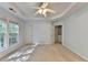Bedroom with a tray ceiling and access to an en-suite bathroom at 2008 Hailston Dr, Duluth, GA 30097