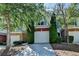 Townhouse exterior with an attached garage and mature landscaping at 2008 Hailston Dr, Duluth, GA 30097