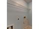 Bare utility area in laundry room, ready for washer/dryer hookups and shelving installation at 2008 Hailston Dr, Duluth, GA 30097