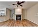 Bright living area featuring a fireplace and a modern staircase at 2008 Hailston Dr, Duluth, GA 30097