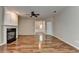 Bright living room featuring a cozy fireplace and ceiling fan at 2008 Hailston Dr, Duluth, GA 30097