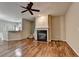 Cozy living room with hardwood floors and a fireplace at 2008 Hailston Dr, Duluth, GA 30097