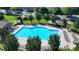 Aerial view of the community pool surrounded by lounge chairs and landscaped grounds at 2008 Hailston Dr, Duluth, GA 30097