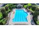 Overhead shot of a community pool with lounge seating, surrounded by manicured landscaping at 2008 Hailston Dr, Duluth, GA 30097