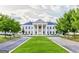 Grand white building with large columns and manicured lawn at 6205 Arnall Nw Ct, Acworth, GA 30101