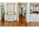 Elegant kitchen with custom cabinetry, hardwood flooring, and stainless steel appliances at 6205 Arnall Nw Ct, Acworth, GA 30101