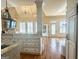Open floor plan featuring living room with fireplace, large windows, and hardwood floors at 6205 Arnall Nw Ct, Acworth, GA 30101