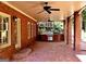 Covered outdoor patio with a full kitchen, perfect for al fresco dining and entertaining at 6205 Arnall Nw Ct, Acworth, GA 30101