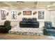 Entertainment room featuring tiered seating, a projector screen, and reclining chairs for a theater experience at 6205 Arnall Nw Ct, Acworth, GA 30101