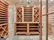 Elaborate wine cellar with custom wood shelving and exposed brick detailing, designed for the wine enthusiast at 6205 Arnall Nw Ct, Acworth, GA 30101