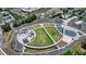 Expansive community park showcasing green spaces, walking paths, recreational areas, and surrounding neighborhood at 1002 Harvest Park Ln, Suwanee, GA 30024