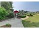 A winding path leads to the barn at 1002 Harvest Park Ln, Suwanee, GA 30024