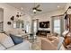 Bright living room with a fireplace, and contemporary decor at 1002 Harvest Park Ln, Suwanee, GA 30024