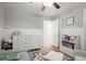 Charming bedroom with modern accents, wainscoting, and space for relaxation at 4371 N Park Dr, Tucker, GA 30084