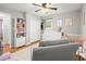 Bright Bedroom with a crib, changing table, and plenty of room for play at 4371 N Park Dr, Tucker, GA 30084