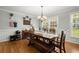 Well-lit dining area with hardwood floors and stylish decor at 4371 N Park Dr, Tucker, GA 30084