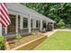 Charming brick home with covered entryway and well-maintained landscaping at 4371 N Park Dr, Tucker, GA 30084