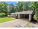 Brick home with covered parking and meticulously maintained lawn at 4371 N Park Dr, Tucker, GA 30084