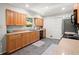 Updated kitchen featuring granite counters, stainless steel appliances, tile floor, and ample cabinet space at 4371 N Park Dr, Tucker, GA 30084