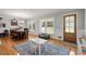 Bright living room with hardwood floors, large windows, and traditional decor at 4371 N Park Dr, Tucker, GA 30084
