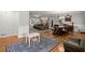 Open-concept living room and dining area with hardwood floors and natural light at 4371 N Park Dr, Tucker, GA 30084