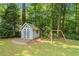 Backyard shed and play area, perfect for storage and outdoor activities at 4371 N Park Dr, Tucker, GA 30084