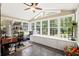 Bright sunroom with multiple windows, tile floor, built-in cabinets, and plenty of natural light at 4371 N Park Dr, Tucker, GA 30084