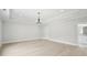 Spacious bedroom with hardwood floors, recessed lighting, and ensuite bathroom at 4539 Braselton Hwy, Hoschton, GA 30548