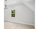 Neutral bedroom with hardwood floors and window view at 4539 Braselton Hwy, Hoschton, GA 30548