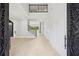 Welcoming foyer featuring a staircase, hardwood floors, and elegant molding at 4539 Braselton Hwy, Hoschton, GA 30548