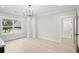 Open-concept living room with wood floors, natural light, and calming paint tones for a bright atmosphere at 4539 Braselton Hwy, Hoschton, GA 30548