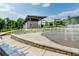 Modern amphitheater with splashpad and manicured lawn perfect for outdoor events and Gathering fun at 5152 Suggs St, Powder Springs, GA 30127