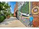 Brick building adorned with a historical mural, showcasing Powder Springs and its vibrant street art at 5152 Suggs St, Powder Springs, GA 30127