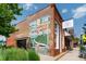 Picturesque building with vibrant mural artwork showcasing Powder Springs' history and attractions at 5152 Suggs St, Powder Springs, GA 30127