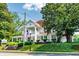 Stately two-story home with classic architectural details and inviting front porch at 5152 Suggs St, Powder Springs, GA 30127